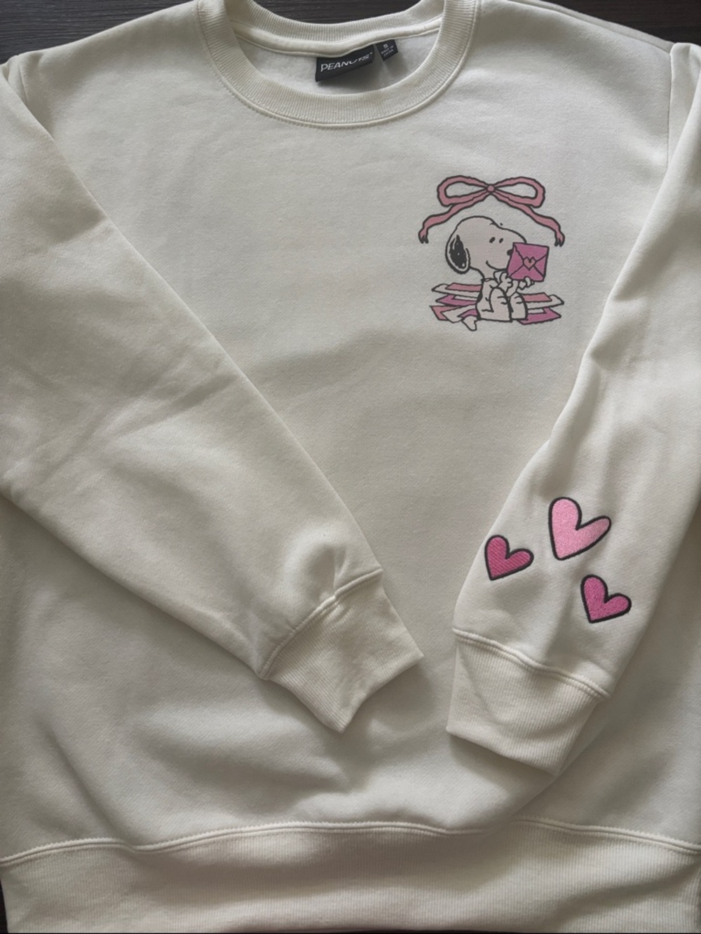 Peanuts Cream Sweatshirt with Pink Snoopy Motif